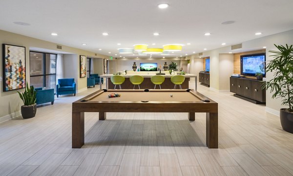 Clubhouse featuring modern design and spacious seating at The Verge Apartments