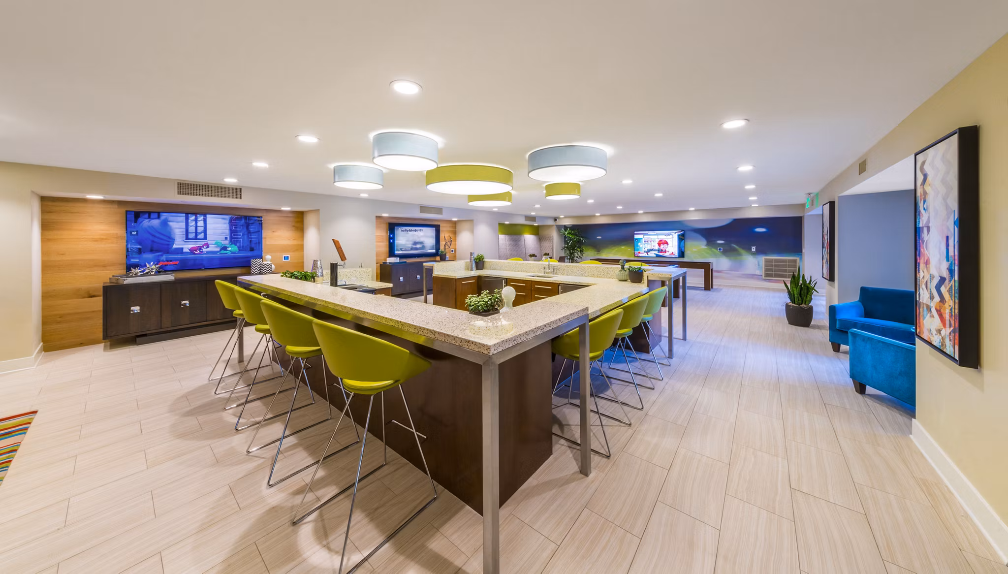 Clubhouse with modern design and cozy seating areas at The Verge Apartments, a Greystar luxury community