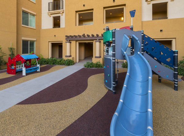 Colorful playground with modern equipment at The Verge Apartments, a Greystar luxury community in a family-friendly neighborhood