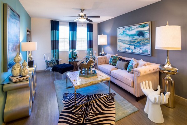 Spacious living room with modern furnishings at Blue Sol Apartments in Greystar luxury community