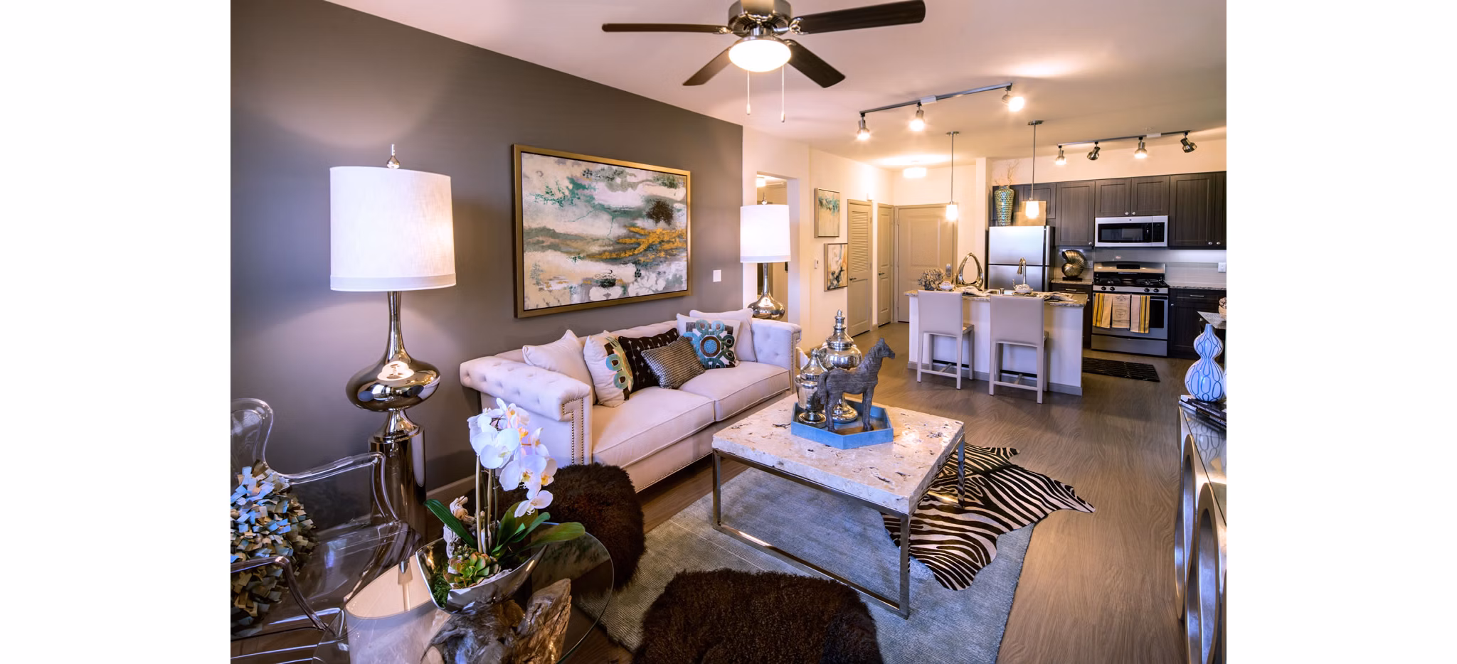 Modern living room with chic furnishings in Blue Sol Apartments