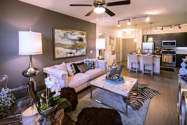 Modern living room with chic furnishings in Blue Sol Apartments