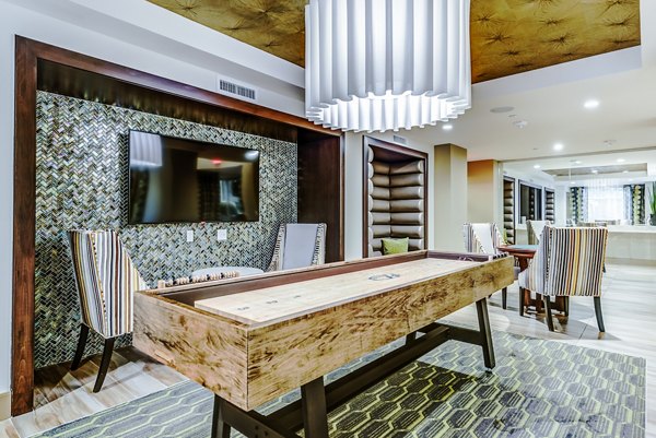 Game room featuring billiards and gaming consoles at Luce Apartments