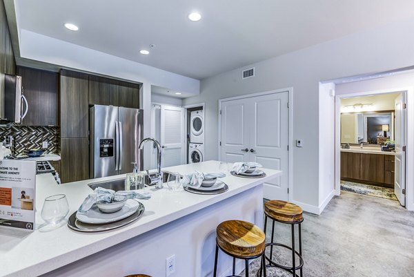 Dining area with modern design elements at Luce Apartments, Greystar luxury property