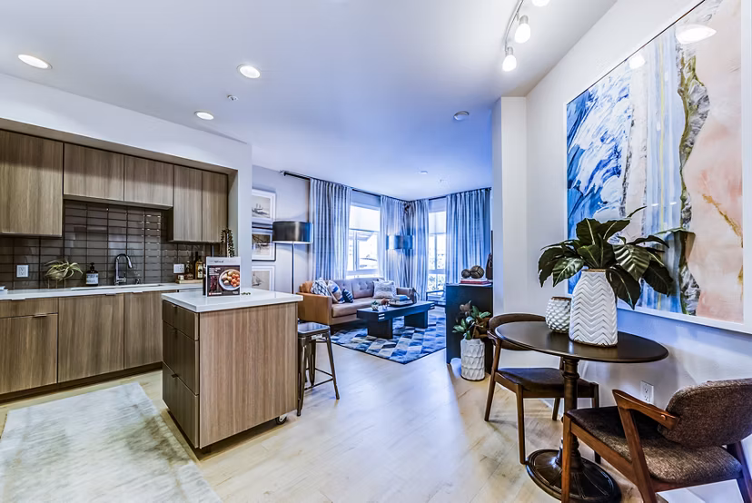 Luce Apartments: Elegant dining room with modern decor and ample natural light