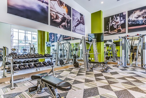 State-of-the-art fitness center with modern equipment at Luce Apartments, perfect for a luxury workout experience