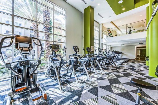 Modern fitness center equipped with state-of-the-art machines at Luce Apartments