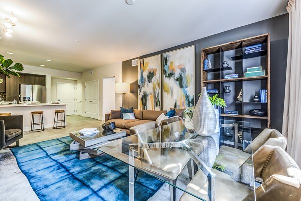 Spacious living room with modern design elements in Luce Apartments, showcasing luxury living spaces in Greystar communities