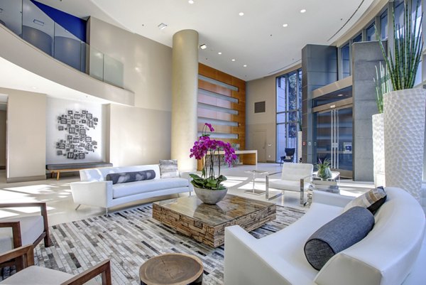 Clubhouse with modern design and plush seating at Argenta Apartments, luxury living by Greystar in a vibrant community setting