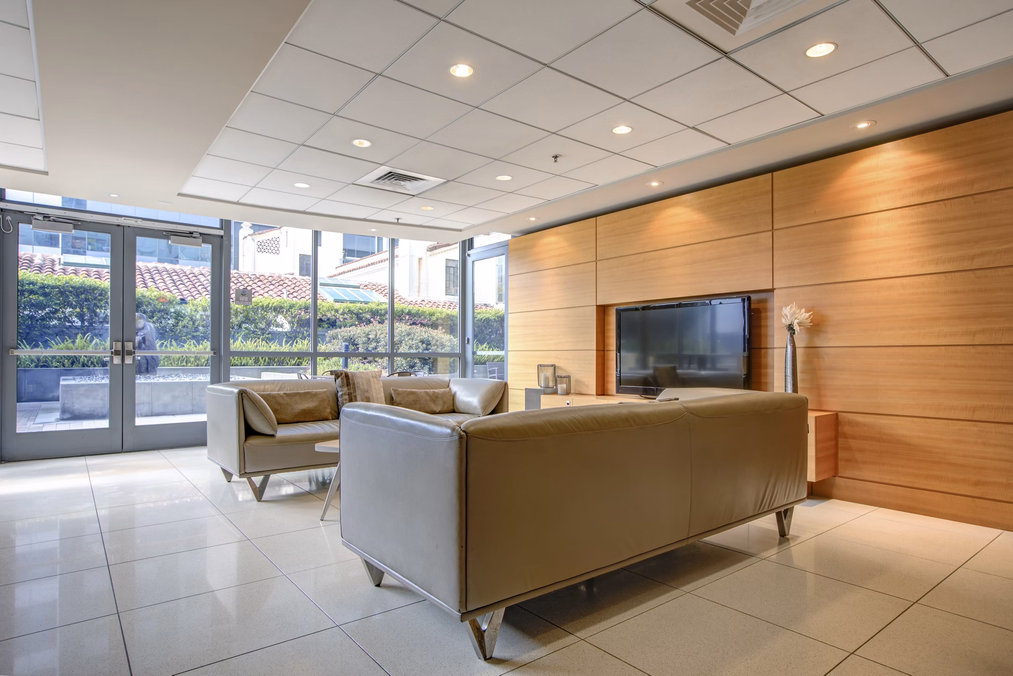 Modern clubhouse with elegant furnishings at Argenta Apartments, offering luxurious amenities for residents in a vibrant community