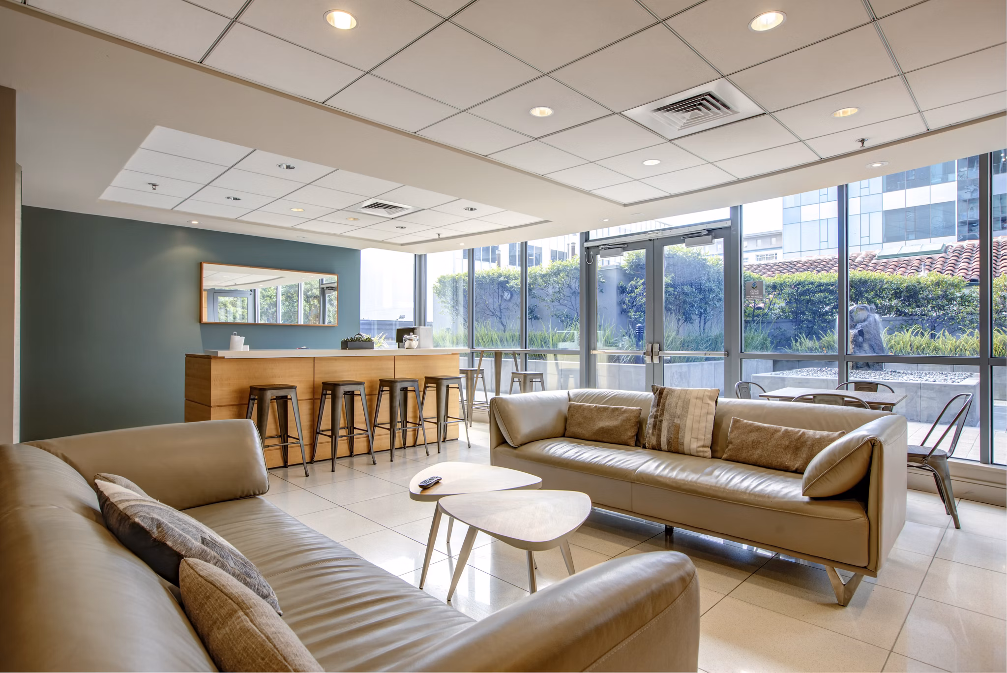 Modern clubhouse featuring elegant design and cozy seating at Argenta Apartments