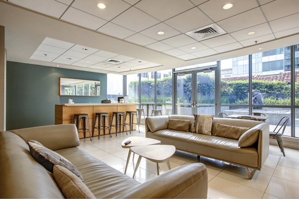 Modern clubhouse featuring elegant design and cozy seating at Argenta Apartments