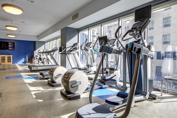 Modern fitness center with state-of-the-art equipment at Argenta Apartments