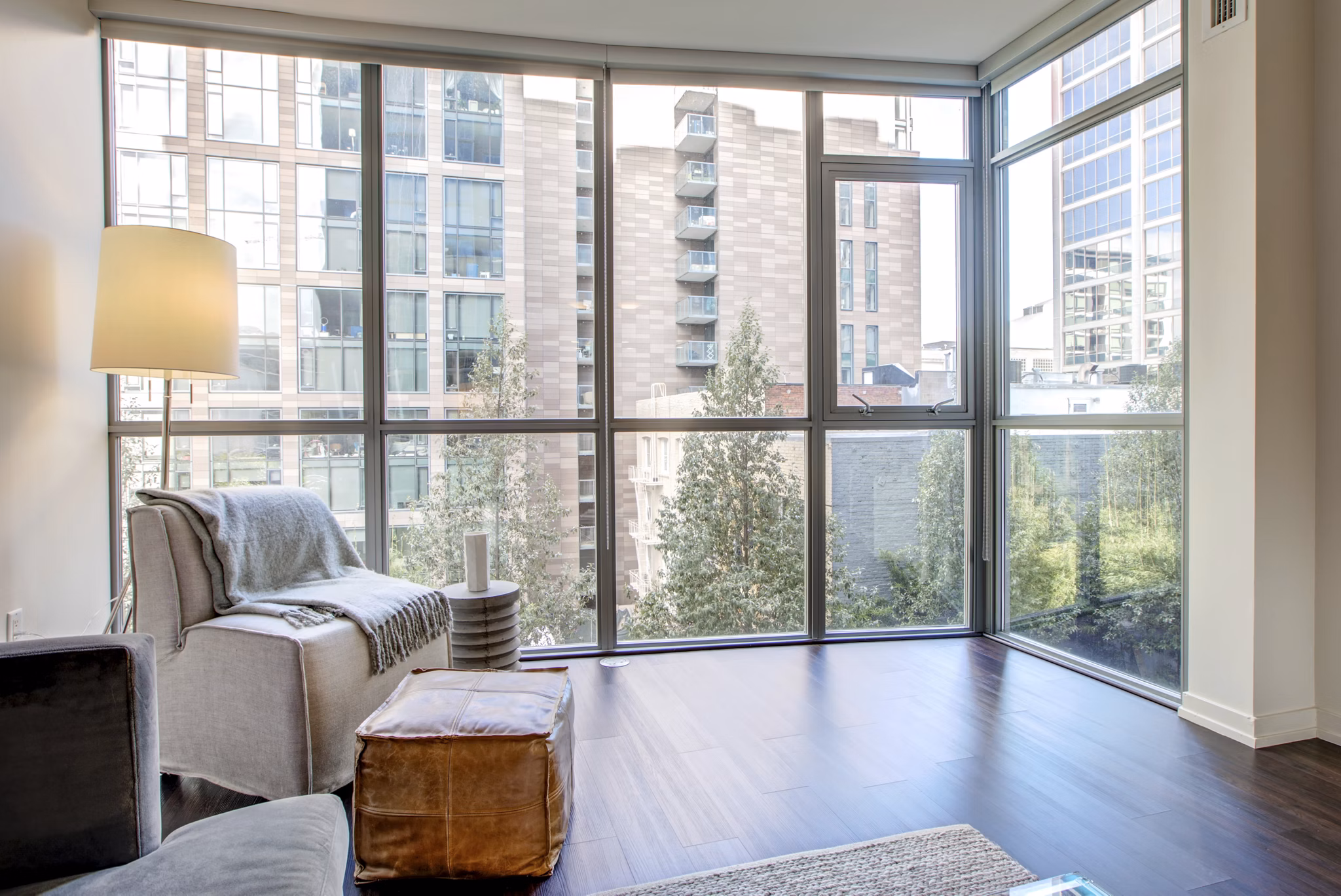 Modern living room with chic decor at Argenta Apartments: luxury rental by Greystar in the heart of the city