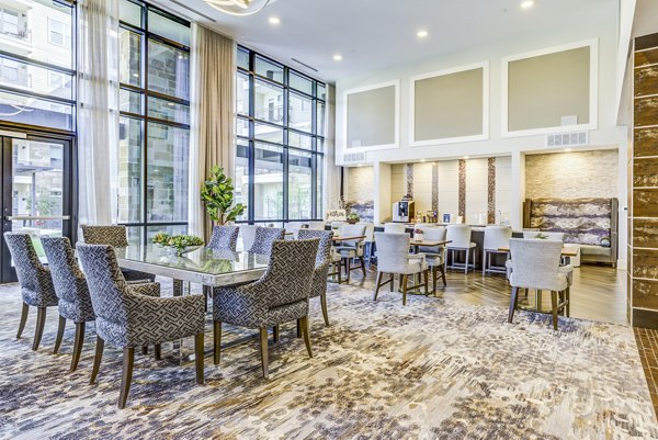 Clubhouse kitchen and dining area at Overture Arboretum Apartments: Stylish communal space for residents