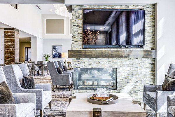 Overture Arboretum: Elegant clubhouse lobby featuring modern decor and seating options