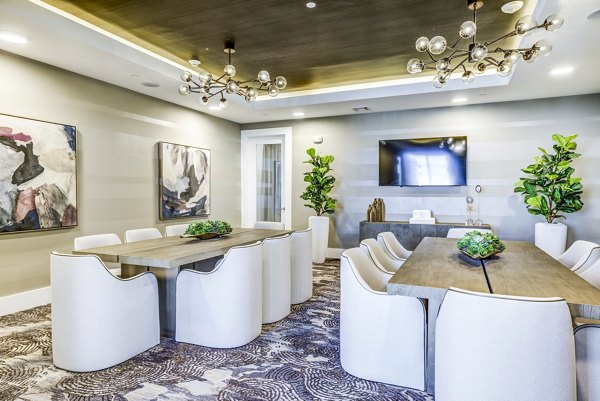 State-of-the-art meeting facility with ergonomic seating at Overture Arboretum Apartments, ideal for corporate gatherings and presentations