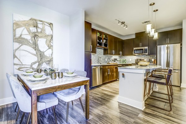 Spacious kitchen with stainless steel appliances at Overture Arboretum Apartments