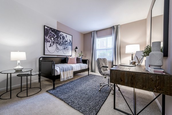 Baileys Crossing: Renovated luxury apartment bedroom with modern furnishings and natural light in 2018 upgrade