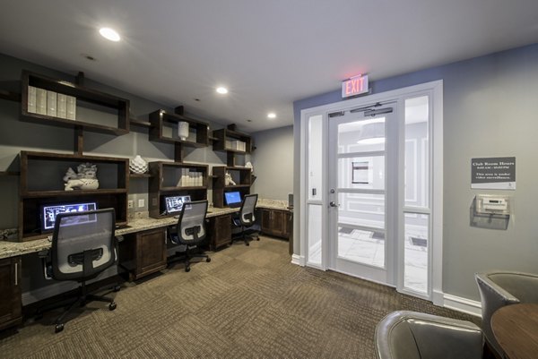 Modern business center with collaboration spaces at Bailey's Crossing Apartments