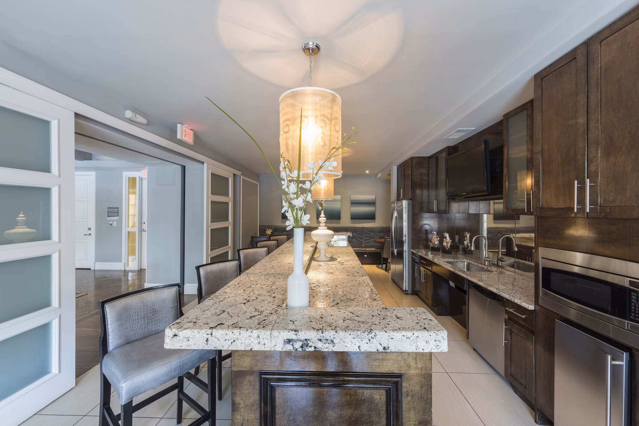 Clubhouse featuring modern design and cozy seating at Bailey's Crossing Apartments
