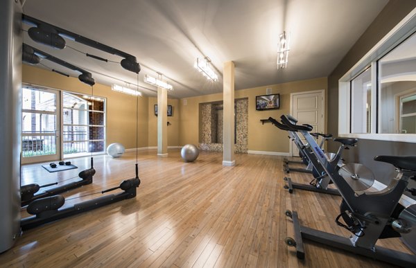 Fitness center with top-of-the-line equipment at Bailey's Crossing Apartments, offering residents a range of workout options for active living