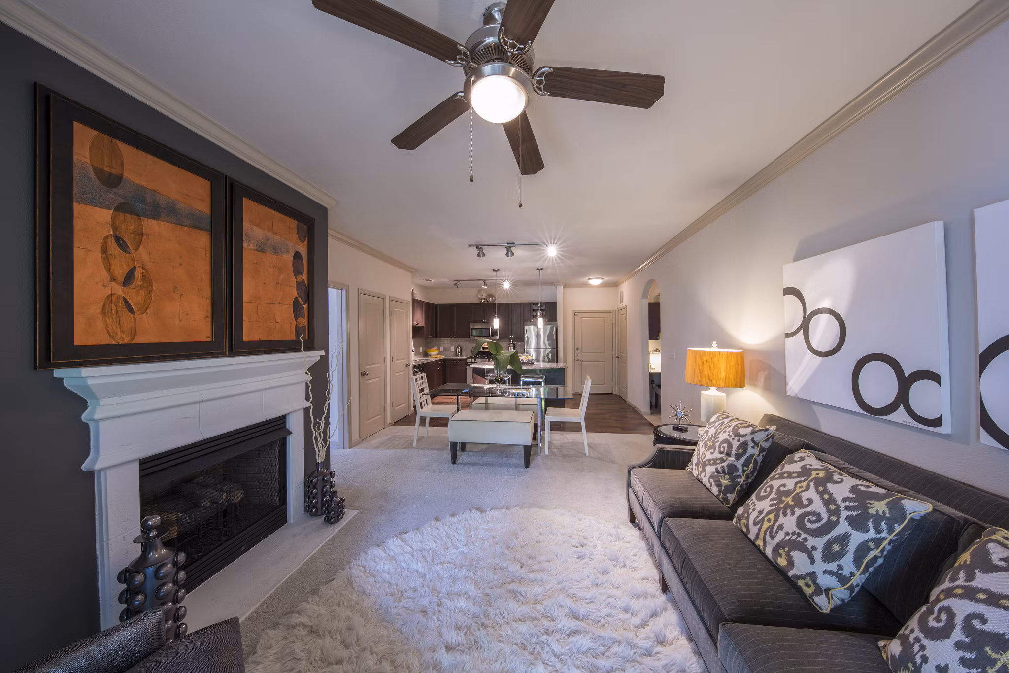 Spacious living room with modern furnishings in Bailey's Crossing Apartments, ideal for luxury living near urban amenities and attractions