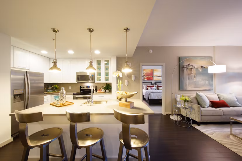Modern kitchen with sleek countertops and stainless-steel appliances at Cyan on Peachtree Apartments in Atlanta