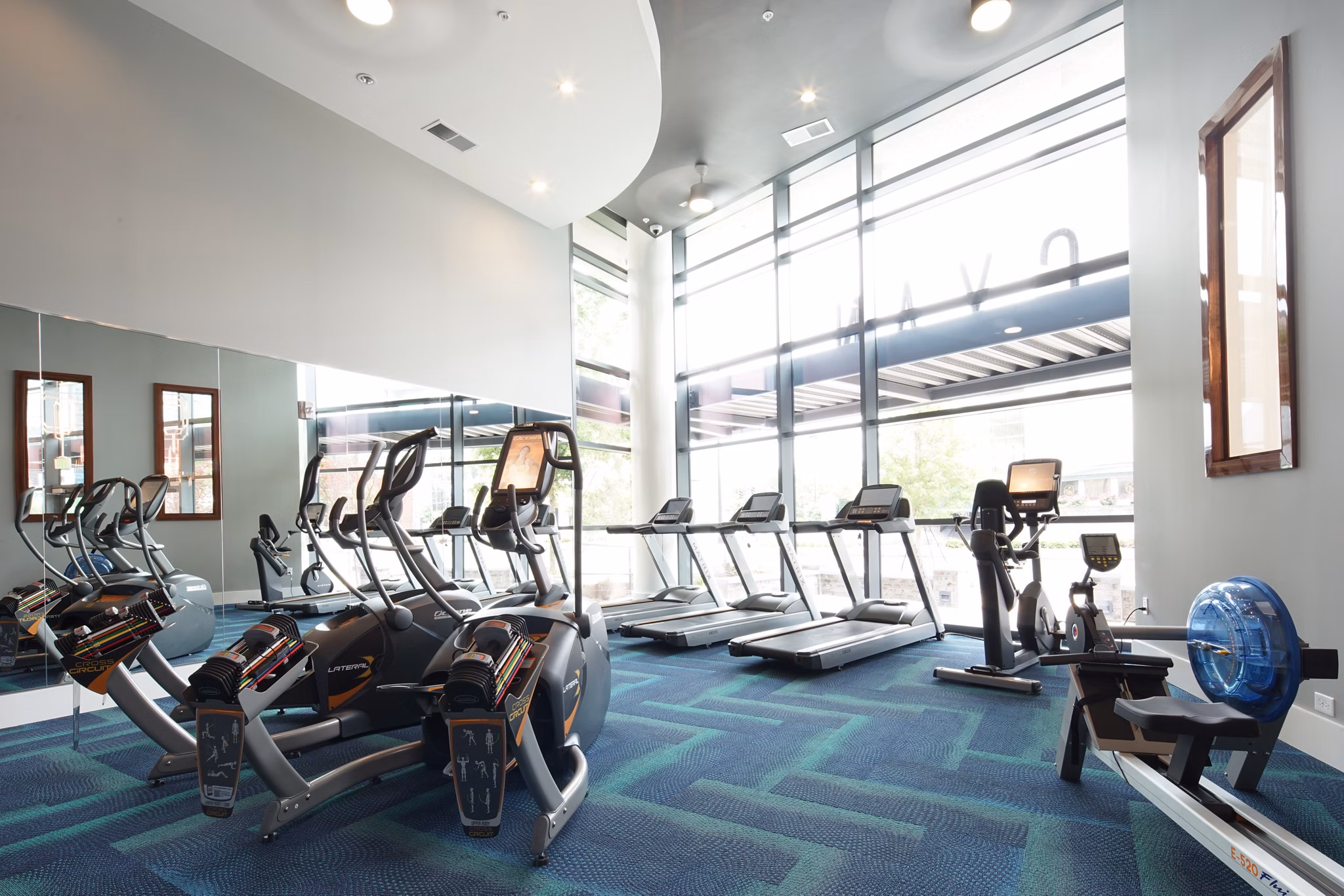 Modern fitness center with state-of-the-art equipment at Cyan on Peachtree Apartments, ideal for maintaining a healthy lifestyle