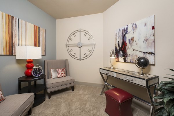 Modern bedroom with cozy decor at Allegro Apartments: luxury living by Greystar