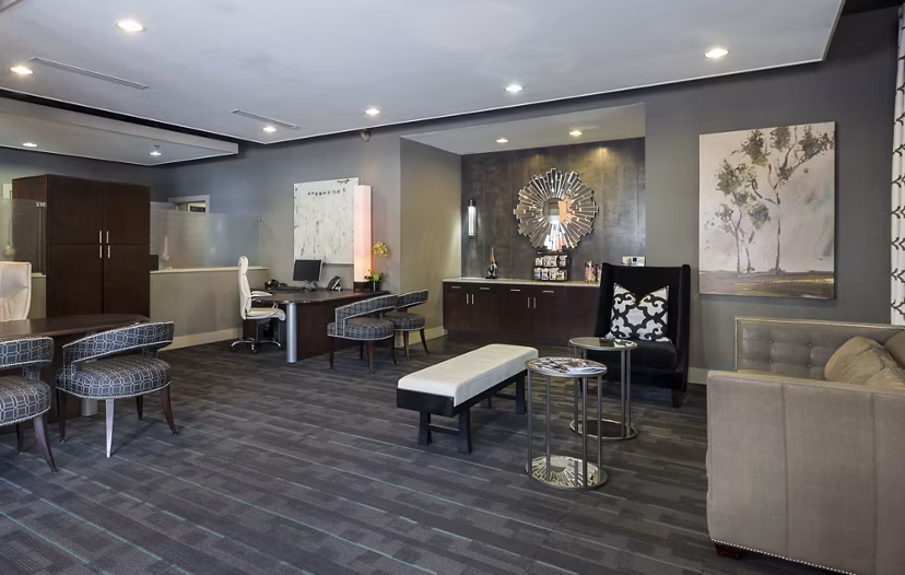 Clubhouse with modern seating and entertainment areas at Allegro Apartments, a premier Greystar luxury residence