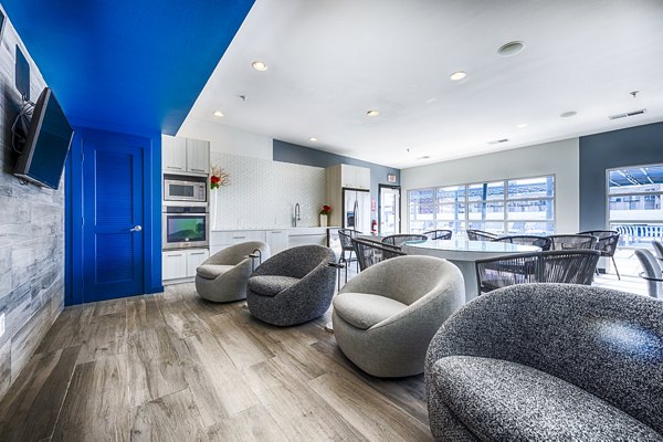 Luxury clubhouse with modern design and cozy seating at Allegro Apartments spurs social connections and relaxation among residents