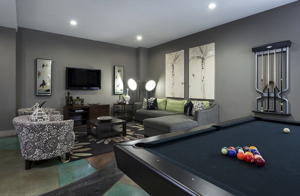 Clubhouse with luxurious seating and modern decor at Allegro Apartments, perfect for socializing and relaxation for residents
