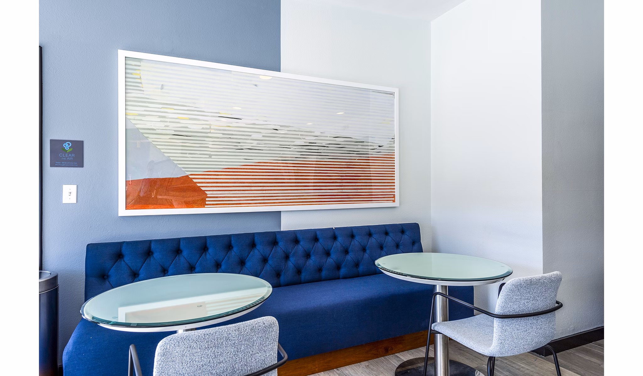 Modern clubhouse with cozy seating and vibrant decor at Allegro Apartments, offering premium amenities for residents in luxury living