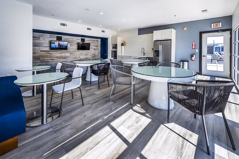 Modern clubhouse with plush seating and stylish decor at Allegro Apartments