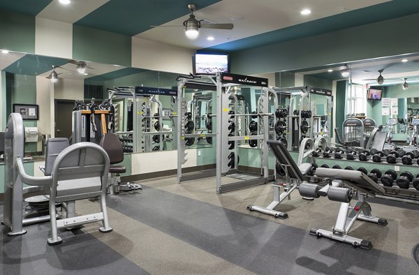 State-of-the-art fitness center featuring modern equipment at Allegro Apartments