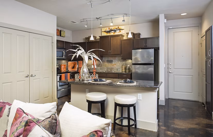 Modern kitchen with stainless steel appliances at Allegro Apartments