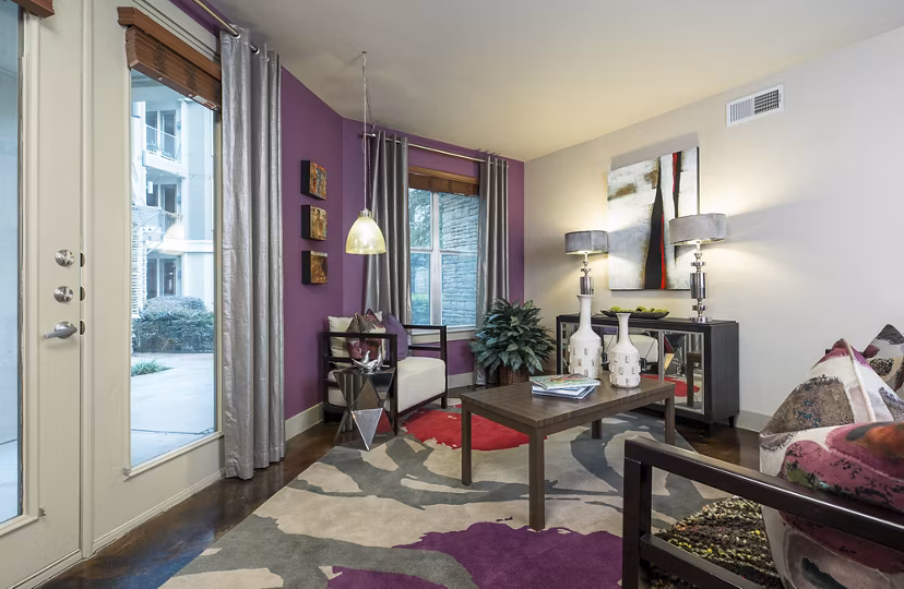 Spacious living room with modern decor in Allegro Apartments offering luxury living in a vibrant community