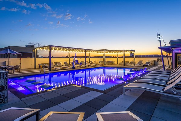Inviting pool area with sun loungers at Allegro Apartments, perfect for relaxation and leisure