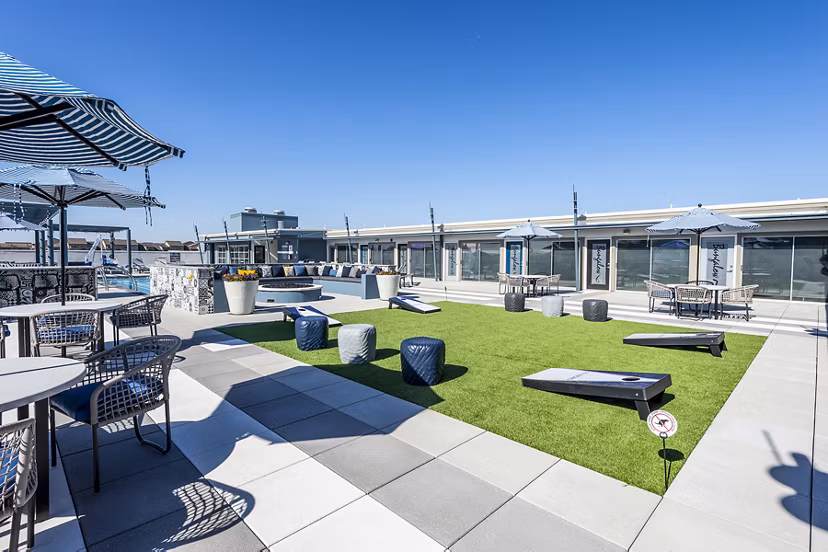 Sport court featuring basketball hoops at Allegro Apartments