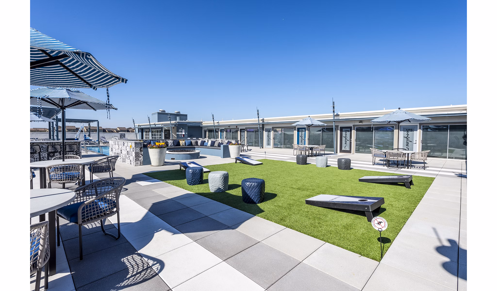 Sport court featuring basketball hoops at Allegro Apartments