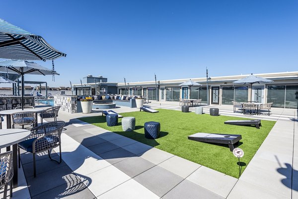 Sport court featuring basketball hoops at Allegro Apartments