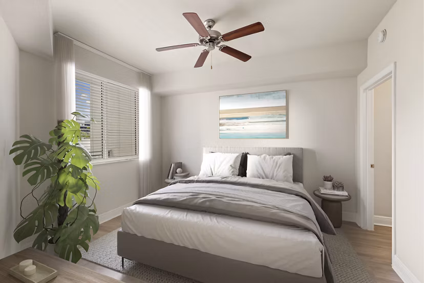 Modern bedroom with stylish furnishings at SoMa at Brickell Apartments