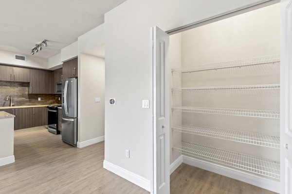 dining area closet at SoMa at Brickell Apartments