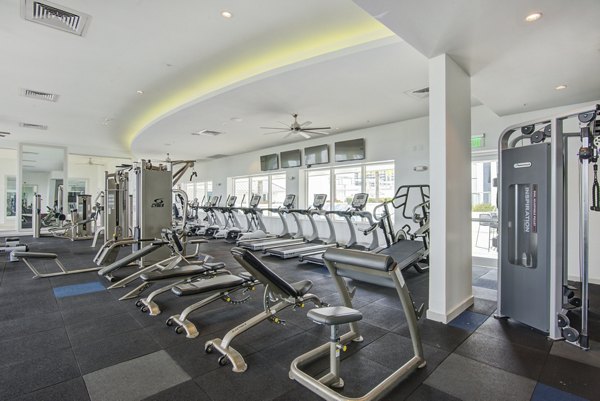 Modern fitness center with state-of-the-art equipment at SoMa at Brickell Apartments