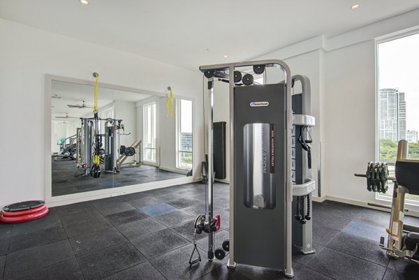 Modern fitness center with state-of-the-art equipment at SoMa at Brickell Apartments