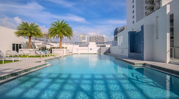 Luxury swimming pool area at SoMa at Brickell Apartments offering premium relaxation and leisure facilities