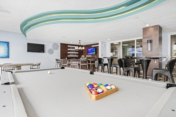 Clubhouse with modern design at Boca City Walk Apartments featuring luxury amenities