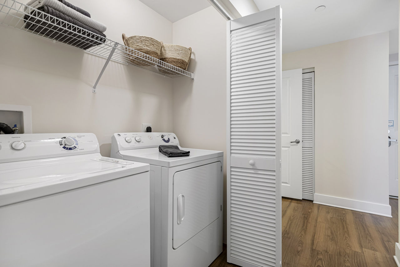 Laundry room at The Mark At Cityscape Apartments