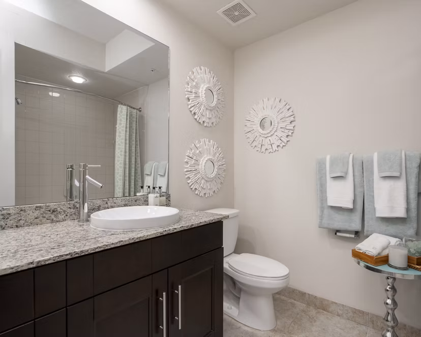 Modern bathroom with sleek fixtures at The Franklin Delray Apartments